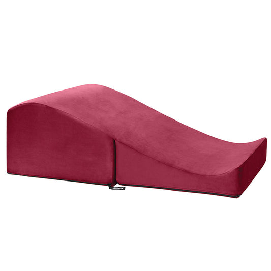 Introducing the Liberator Flip Ramp MicroVelvet-Merlot, a luxurious and versatile addition to your bedroom. This high-quality microvelvet cushion in rich merlot offers support for intimate activities, comfort for lounging, and enhances home decor. Compac..