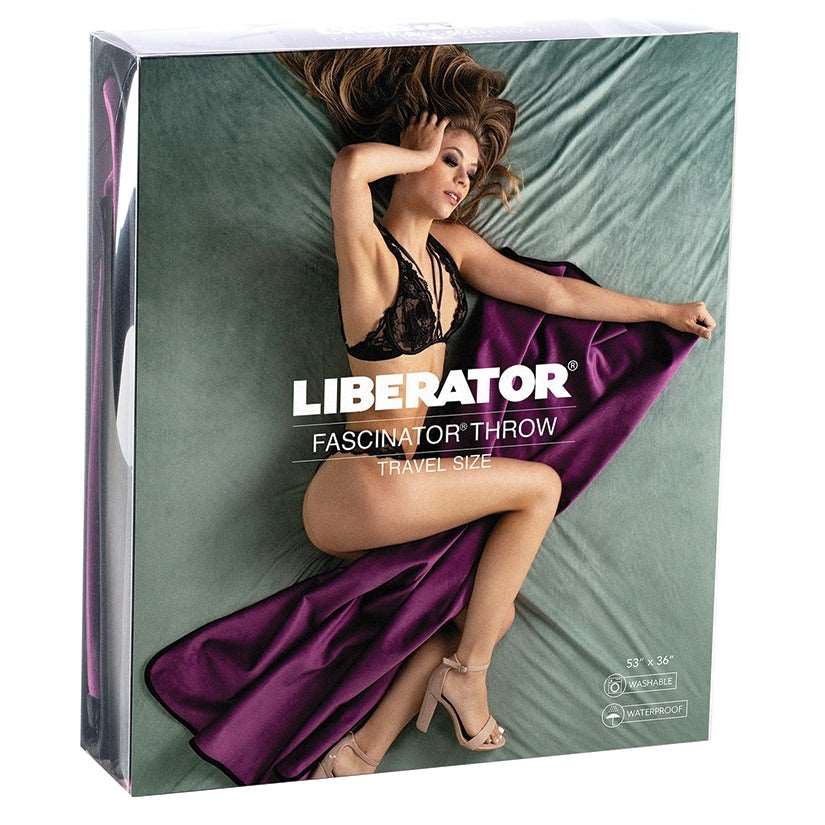 Introducing the Liberator Fascinator Travel Throw in Velvish Aubergine. Luxurious, stylish, and functional, this 72x54 inch throw is perfect for cozy travel. Lightweight, compact, and moisture-resistant, it's easy to pack and clean. Add comfort and style..