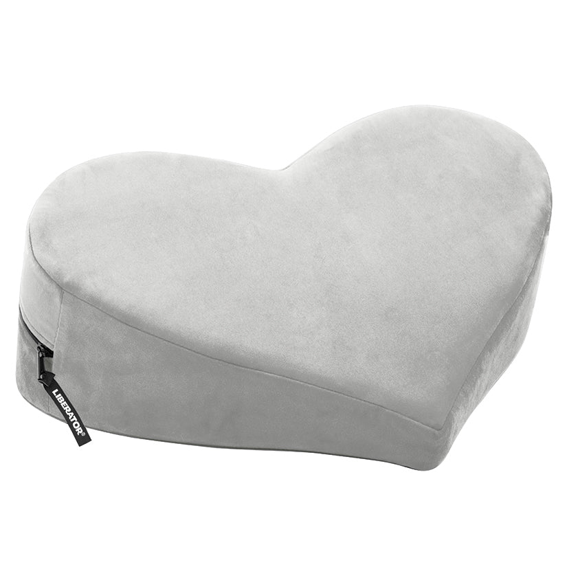 Introducing the Liberator Heart Wedge MicroVelvet-Grey, a luxurious heart-shaped wedge designed for comfort and support during intimate moments. Made from high-quality microvelvet, this grey wedge enhances positioning and pleasure, adding both romance an..